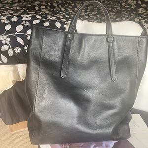 like new Fossil convertible backpack in black.